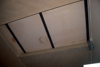 The hatch through which coffins would have been lowered into the crypt - July 2010